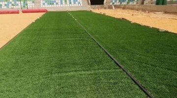 انطلاق أعمال فرد النجيلة في استاد النادي المصري الجديد بمواصفات عالمية بالصور